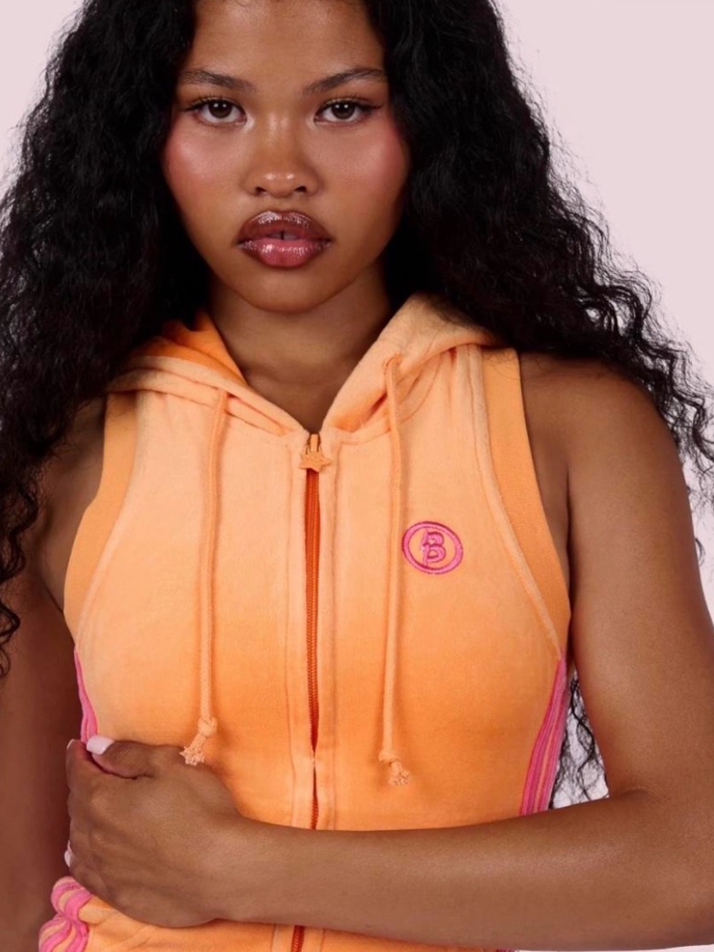 Sleeveless Orange Zip-Up Hoodie with Embroidered Logo